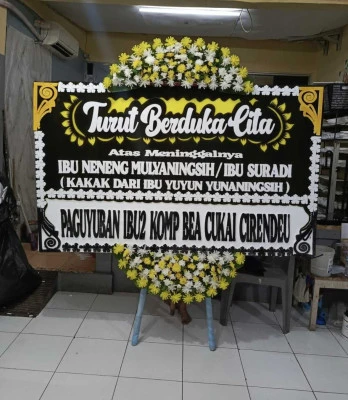 Papan Bunga di Comal